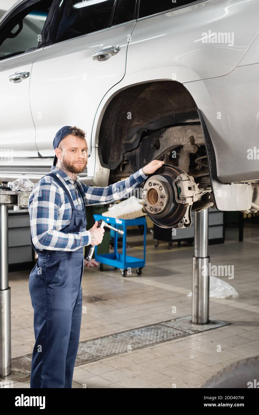 Man standing on raised lift hi-res stock photography and images - Alamy