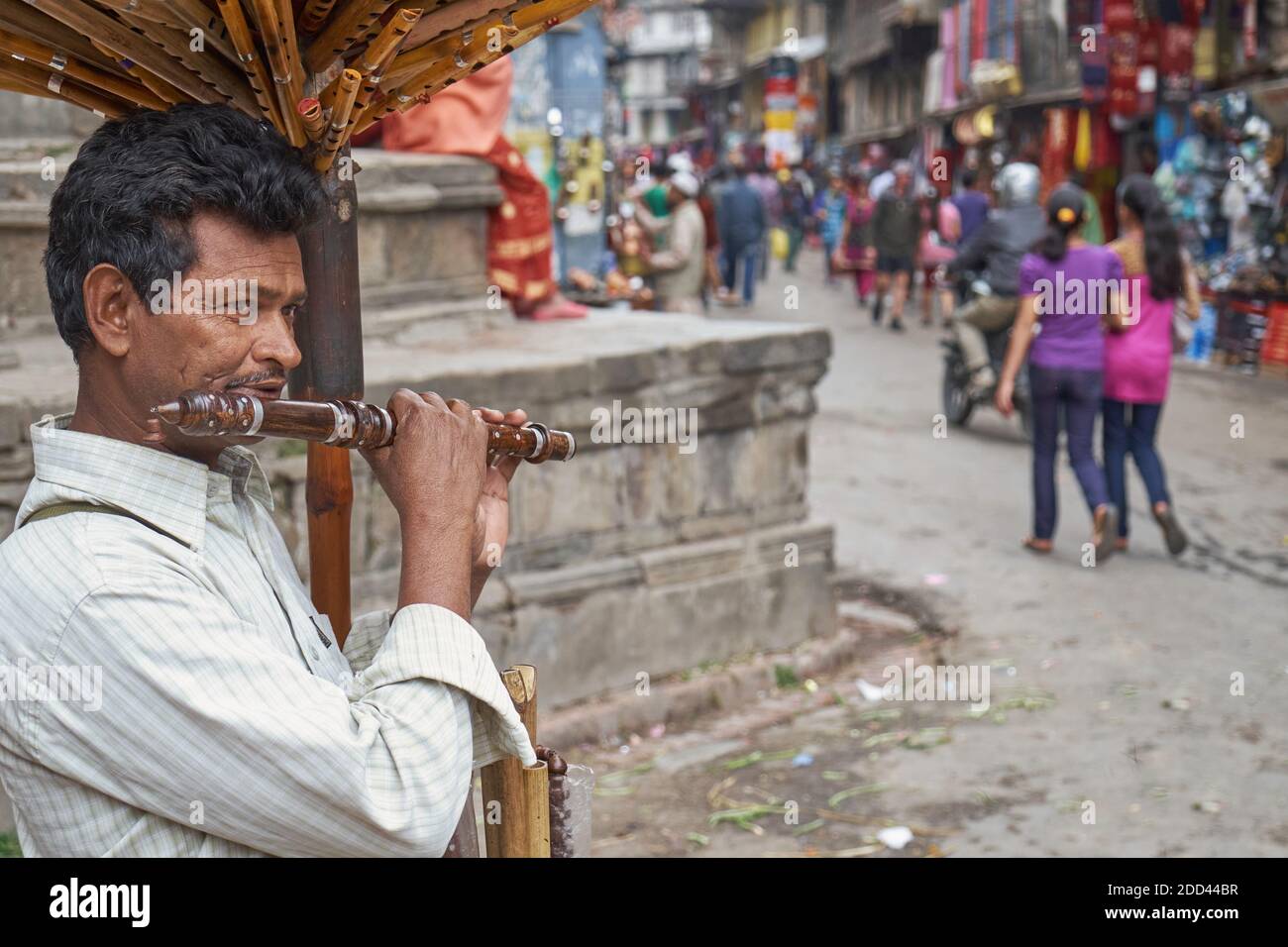 Vendor selling flute hires stock photography and images Alamy