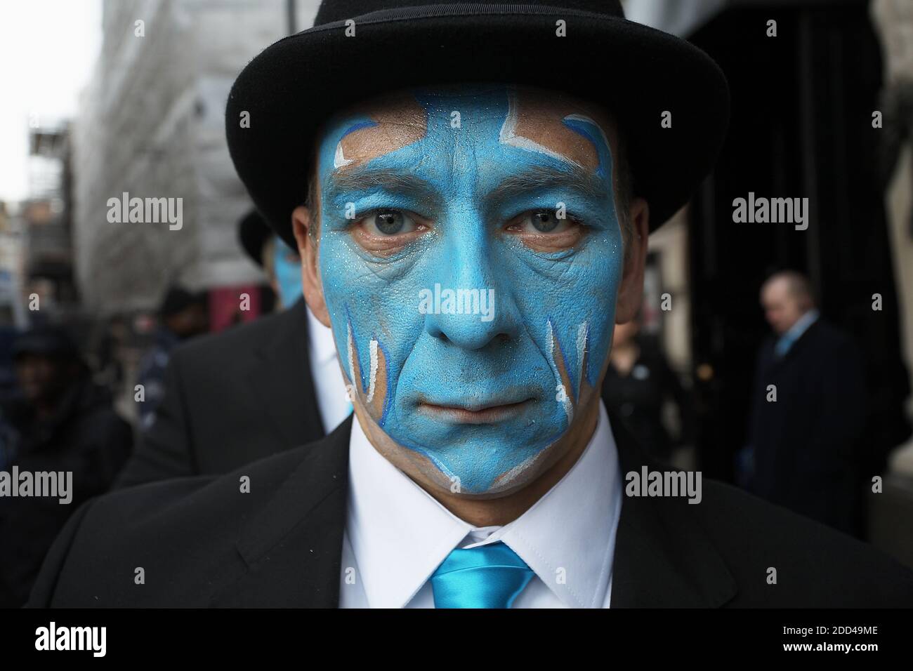 GREAT BRITAIN / England / London /Street performers with painted faces cellebrating the opening  of Barclays Bank  branch at Piccadilly Circus. Stock Photo