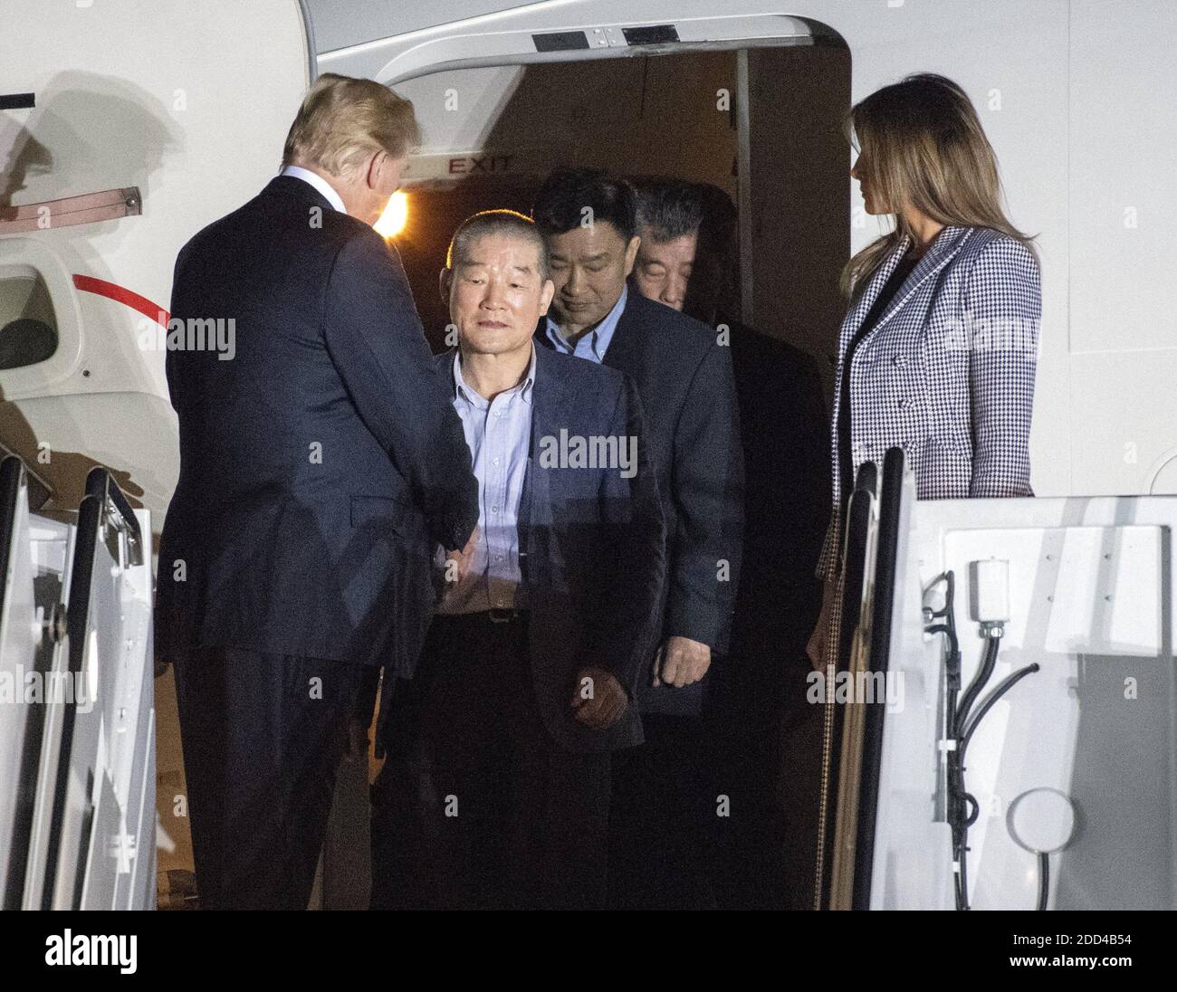 United States President Donald J. Trump welcomes Kim Dong Chul, Kim Hak Song and Tony Kim back to the US at Joint Base Andrews in Maryland on Thursday, May 10, 2018. The three men were imprisoned in North Korea for periods ranging from one and two years. They were released to US Secretary of State Mike Pompeo as a good-will gesture in the lead-up to the talks between President Trump and North Korean leader Kim Jong Un. Photo by Ron Sachs/CNP/ABACAPRESS.COM Stock Photo