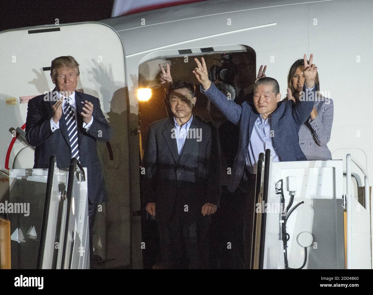 United States President Donald J. Trump welcomes Kim Dong Chul, Kim Hak Song and Tony Kim back to the US at Joint Base Andrews in Maryland on Thursday, May 10, 2018. The three men were imprisoned in North Korea for periods ranging from one and two years. They were released to US Secretary of State Mike Pompeo as a good-will gesture in the lead-up to the talks between President Trump and North Korean leader Kim Jong Un. Photo by Ron Sachs/CNP/ABACAPRESS.COM Stock Photo