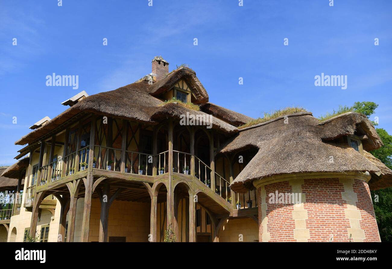 The Hameau de la Reine (The Queen's Hamlet) during its opening to the public after restoration, at the Versailles Palace on May 4, 2018 in Versailles, France. The hamlet of the Queen built by Richard Mique for Marie Antoinette between 1783 and 1787 is an outbuilding of the Petit Trianon located in the park of the Palace of Versailles. This hamlet was commissioned during the winter of 1782-1783 by Queen Marie-Antoinette who wanted to move away from the constraints of the court of Versailles. Photo by Christian Liewig/ABACAPRESS.COM Stock Photo