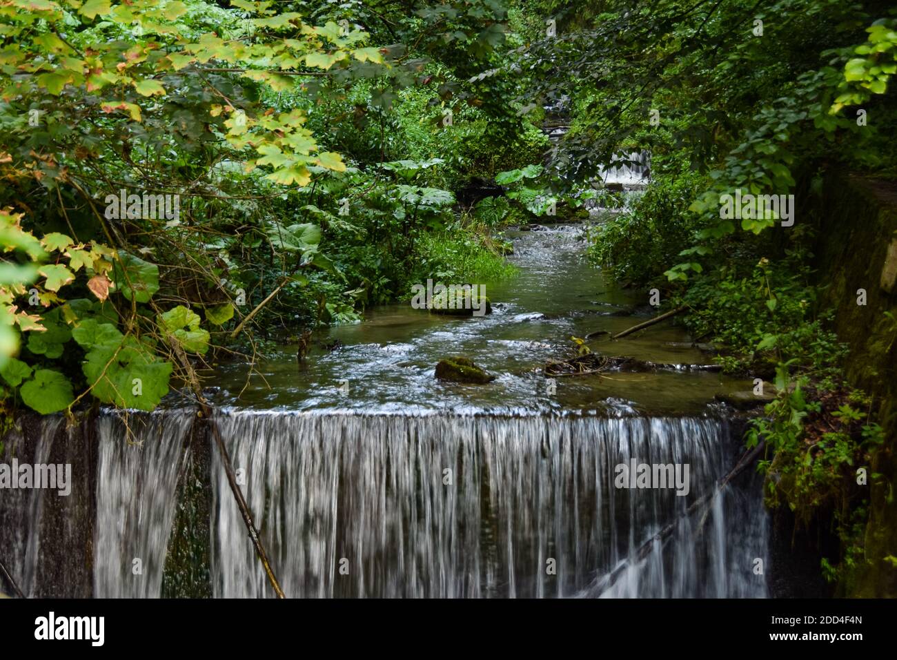 Waterfall on the way to Peles Castle, Sinaia, Romania Stock Photo