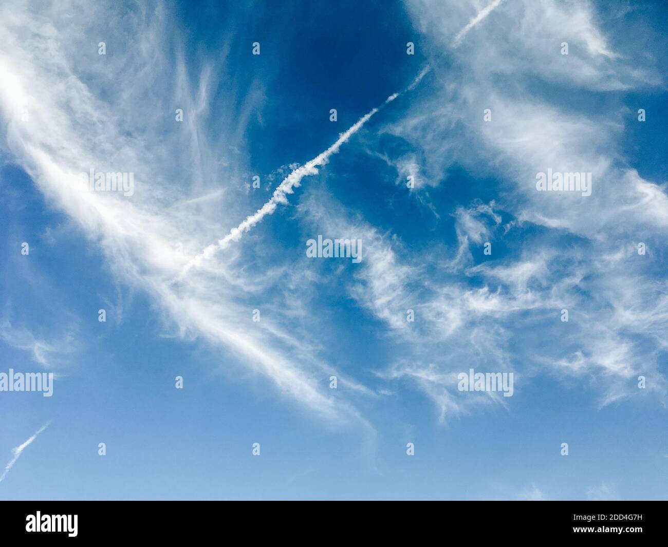 Blue sky with beautiful and fluffy white clouds Stock Photo - Alamy