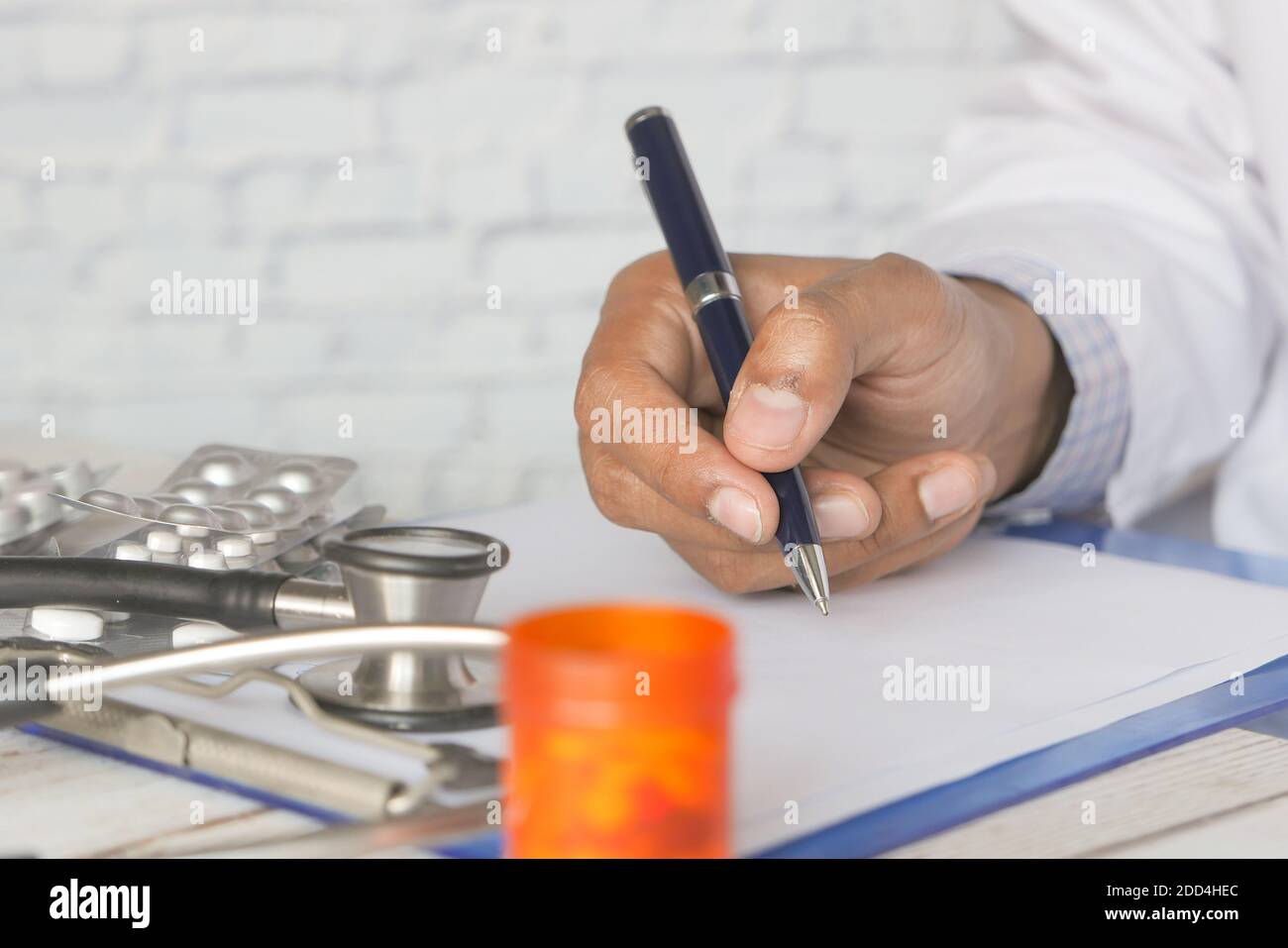 Hand writing medical care hi-res stock photography and images - Alamy