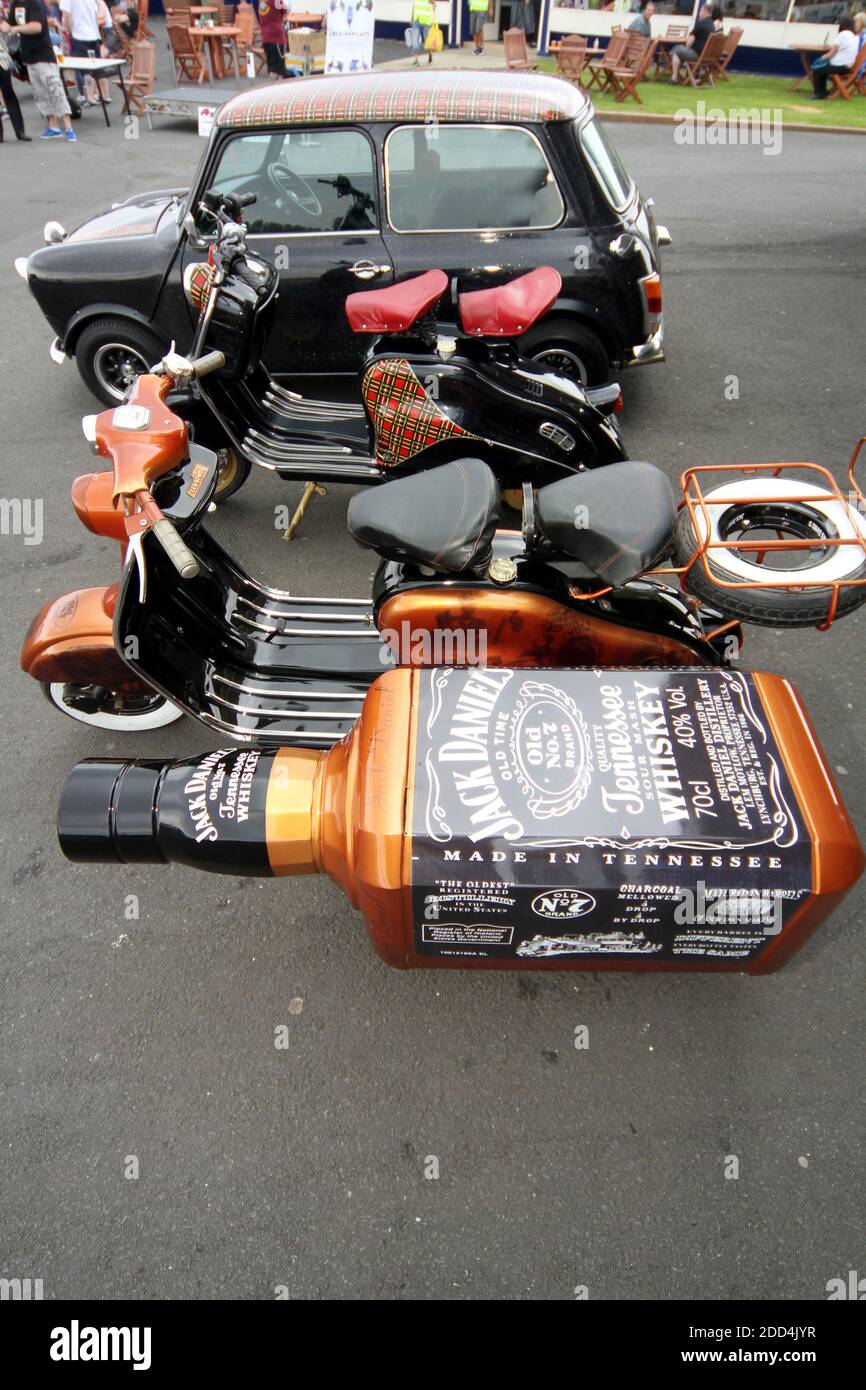 Ayr, Ayr Racecourse, Ayrshire, Scotland, UK. The Honest Men, an Ayrshire based Scooter Club organise two day rally at the venue Unusual  scooter with sidecar looking like a bottle of Jack Daniels Stock Photo