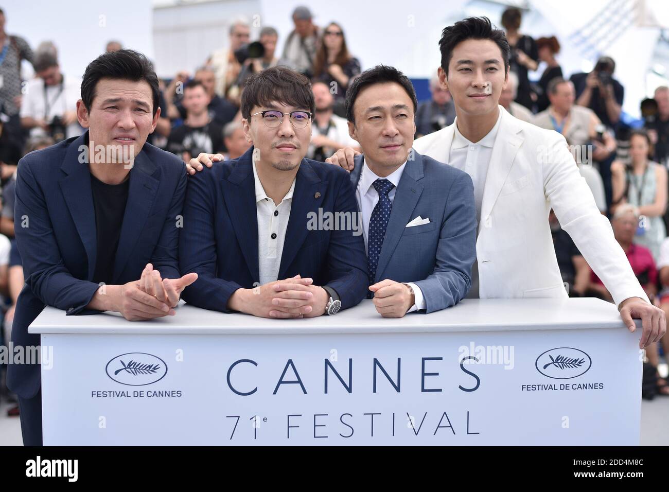 Jung-min Hwang, Sung-min Lee and Ji-Hoon Ju posing at The Spy Gone North photocall held at the Palais des Festivals on May 11, 2018 in Cannes, France as part of the 71st annual Cannes Film Festival. Photo by Lionel Hahn/ABACAPRESS.COM Stock Photo