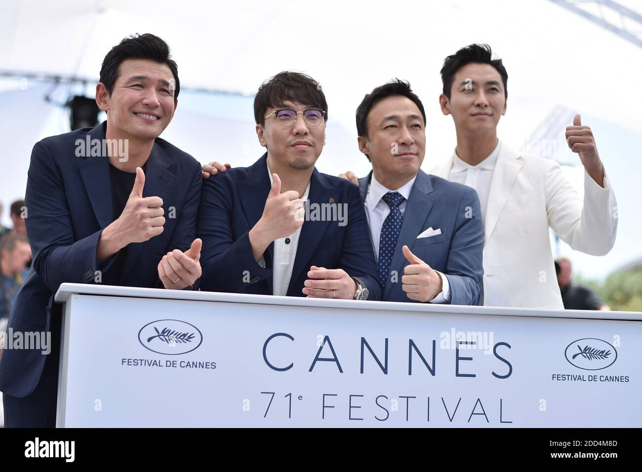 Jung-min Hwang, Sung-min Lee and Ji-Hoon Ju posing at The Spy Gone North photocall held at the Palais des Festivals on May 11, 2018 in Cannes, France as part of the 71st annual Cannes Film Festival. Photo by Lionel Hahn/ABACAPRESS.COM Stock Photo