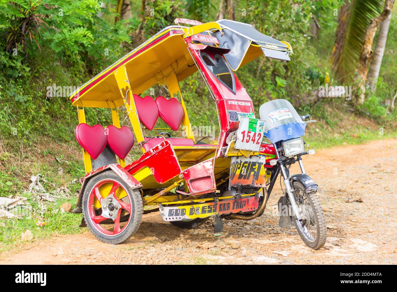 A custom built tricycle, a local passenger vehicle in Mindanao, Philippines Stock Photo