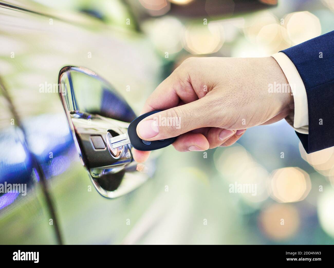 Key unlocking car door Stock Photo Alamy