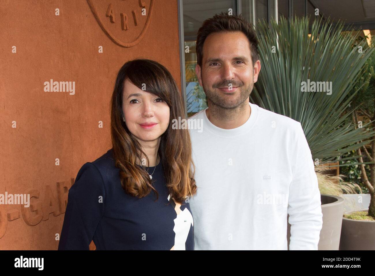 Delphine McCarty and Christophe Michalak at village during French