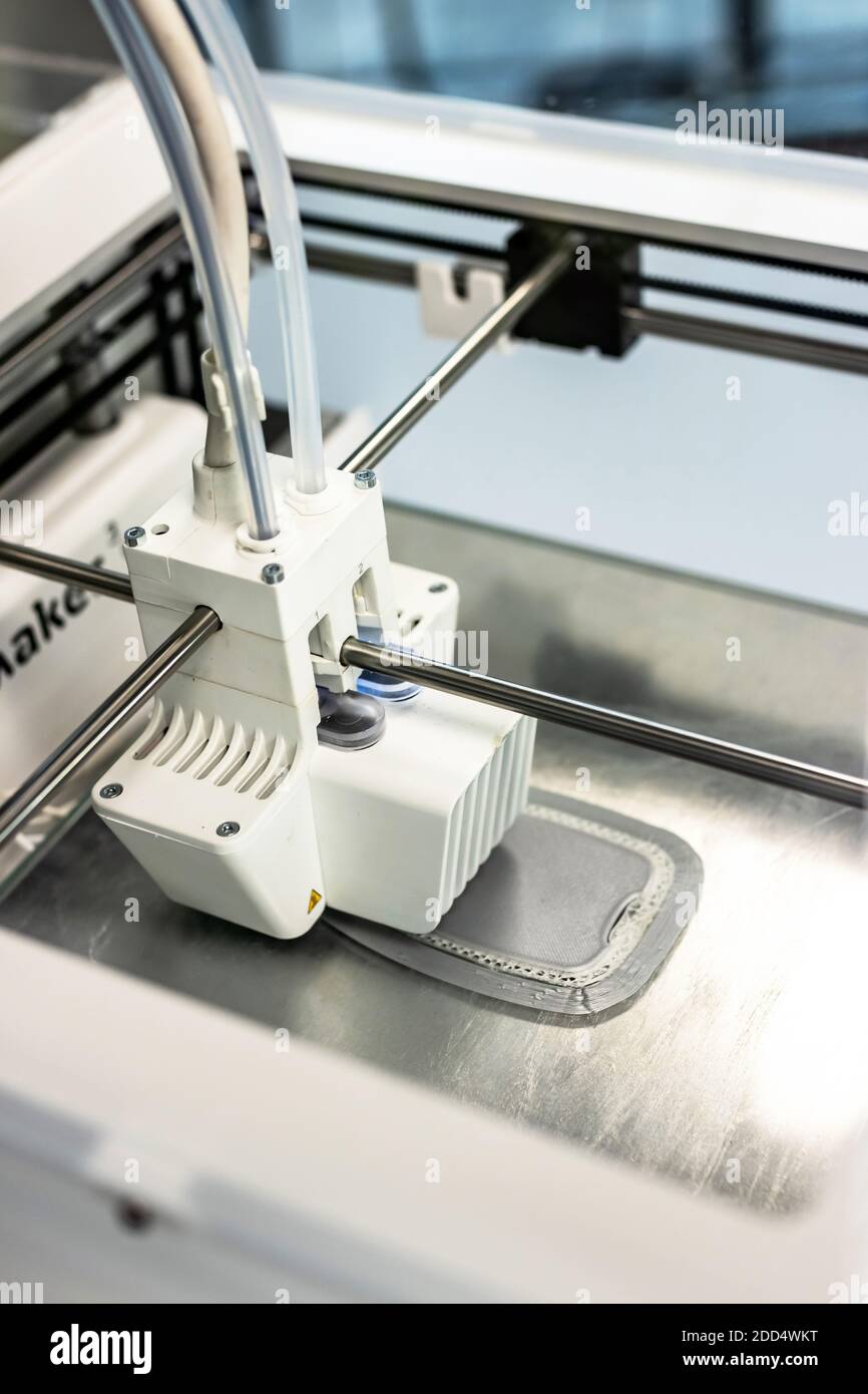 printer head of 3D printer rapid prototyped plastic parts Stock Photo
