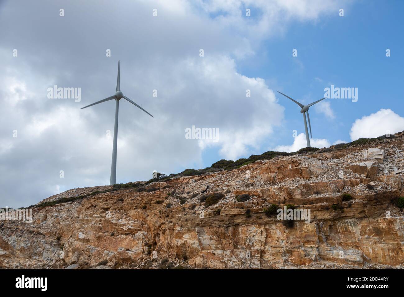 Green Energy, Windmills for electric power production in northern Ios Island, Greece. Stock Photo