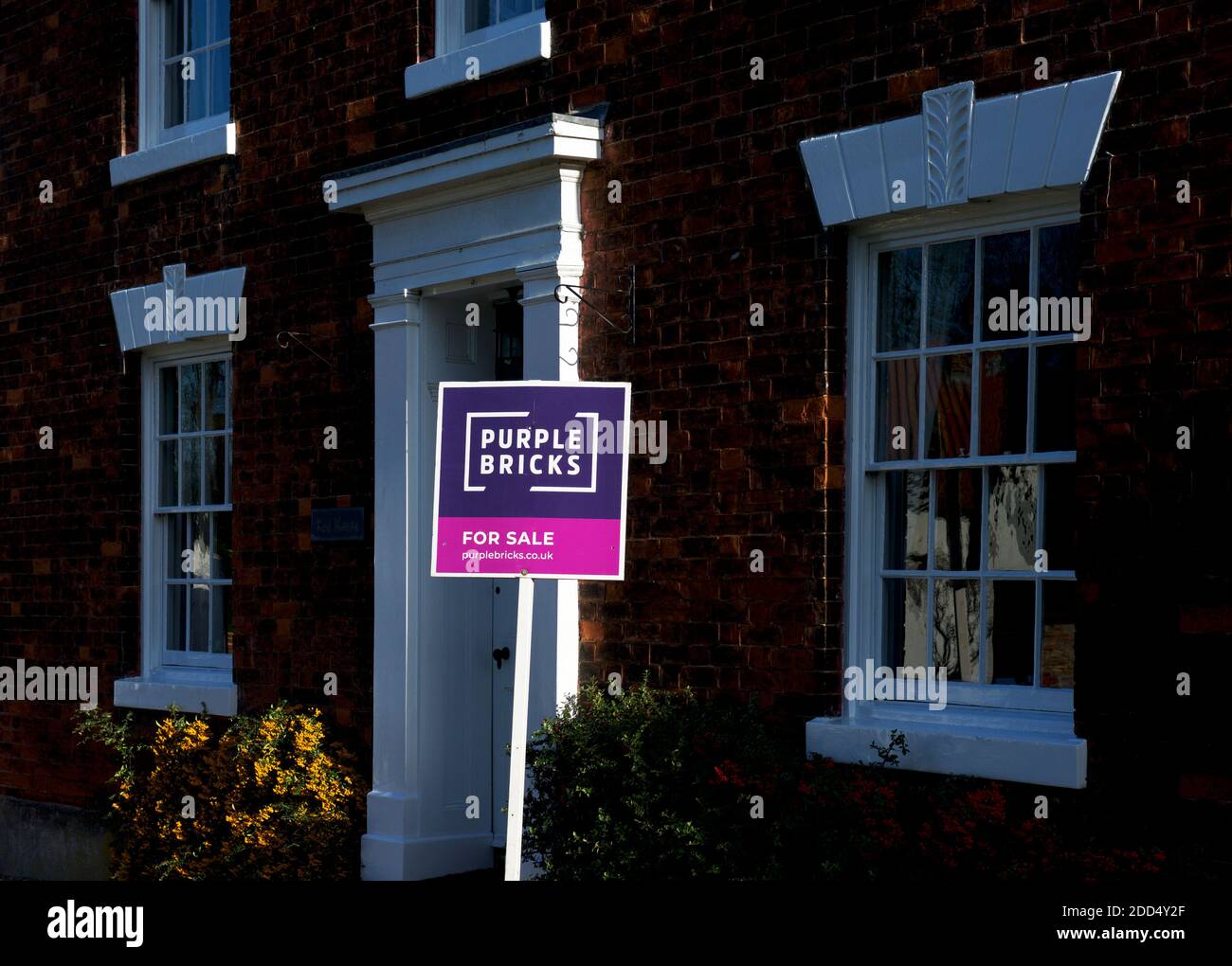 House For Sale sign outside property in Bishop Burton village, East Yorkshire, England UK Stock Photo