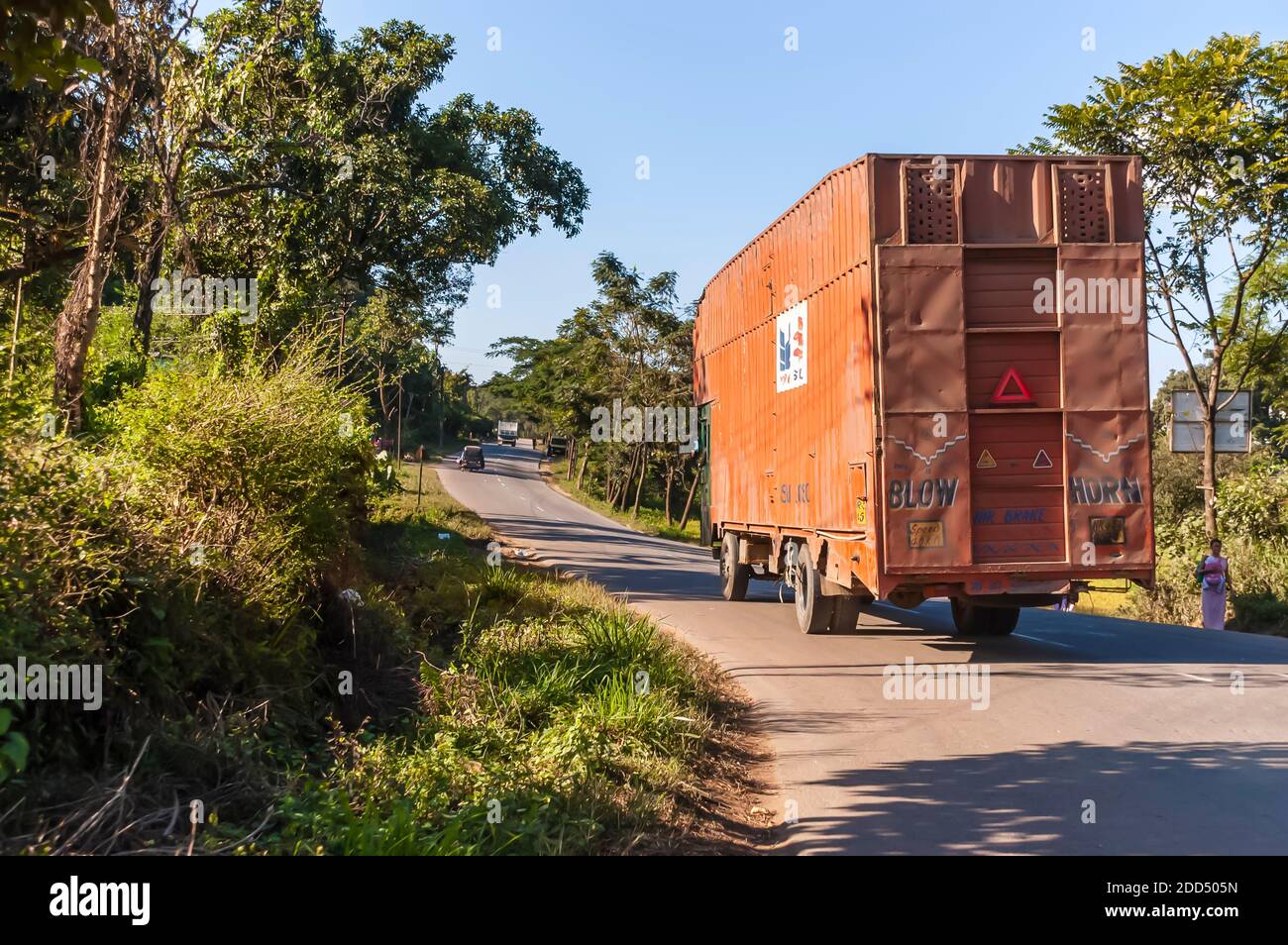 A covered car transporter for Maruti cars on the Shillong-Guwahati highway, Meghalaya, India. Stock Photo