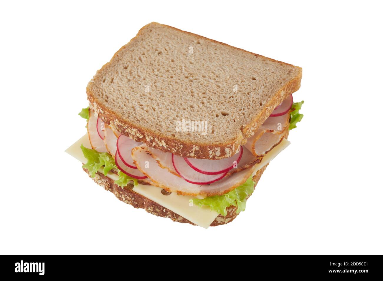 Healthy wholegrain sandwich with ham and cheese with radish and lettuce trimmings viewed high angle isolated on white Stock Photo