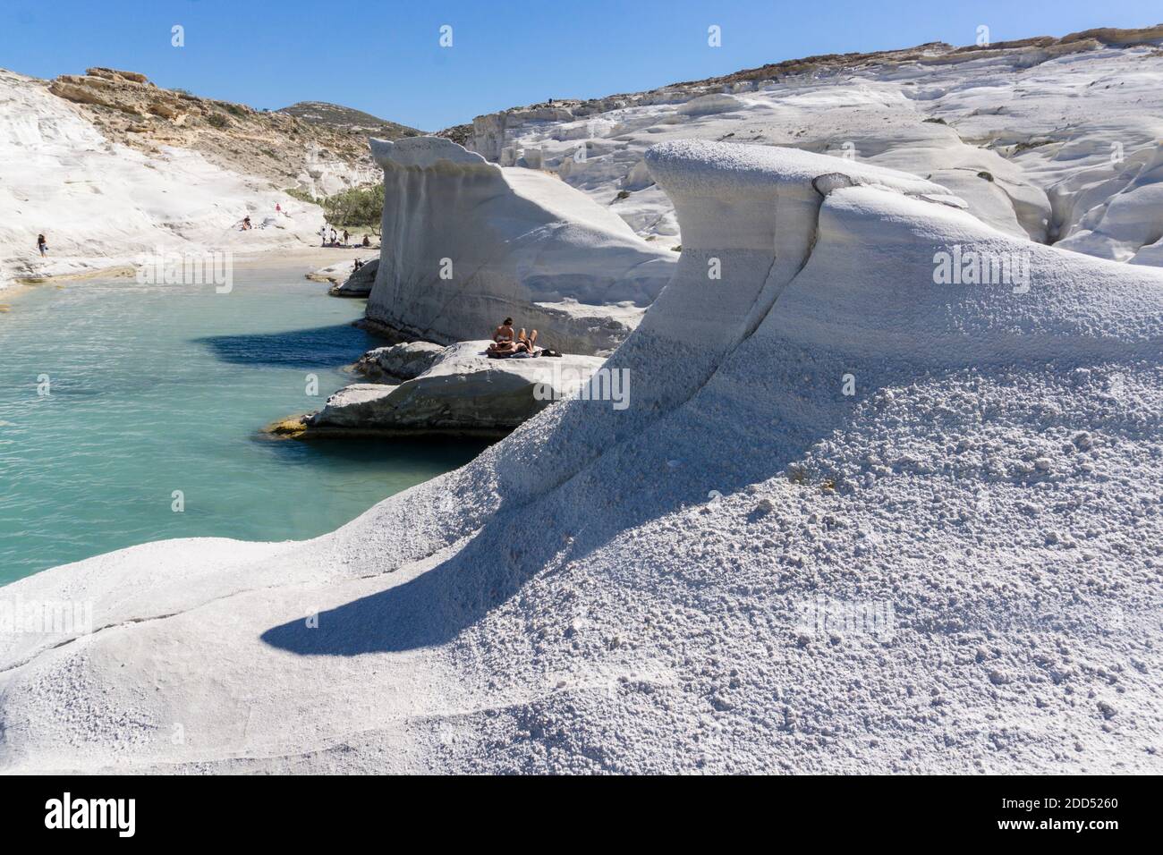 Sarakiniko is a beach on Milos Island, Greece, situated on the north shore of the island. Waves driven by north winds shape the greyish-white volcanic Stock Photo