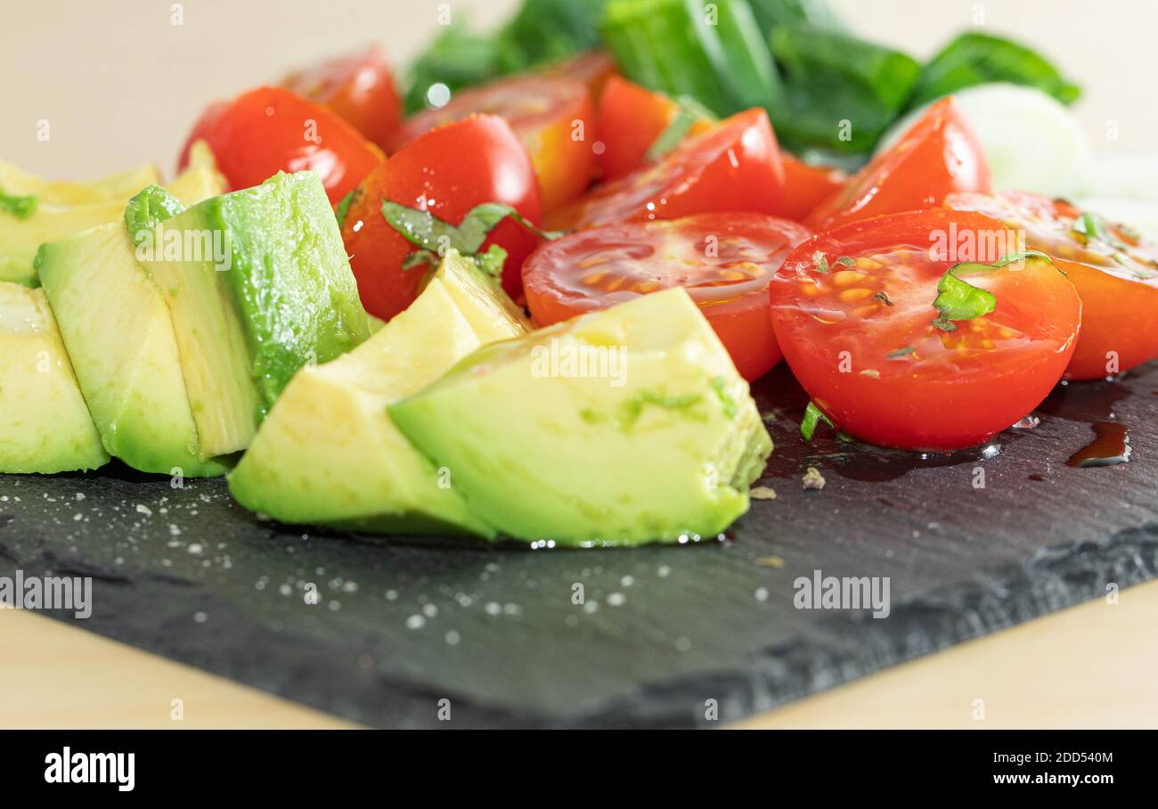 Salad - avocado, spring onion and tomato stock photo Stock Photo