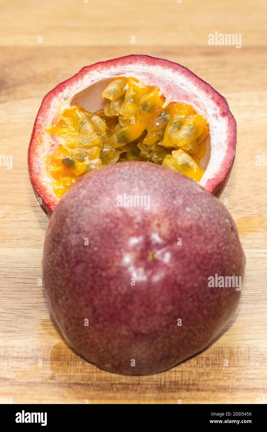 Tasty Passion Fruits On The Wooden Background. Food Photography Stock Photo