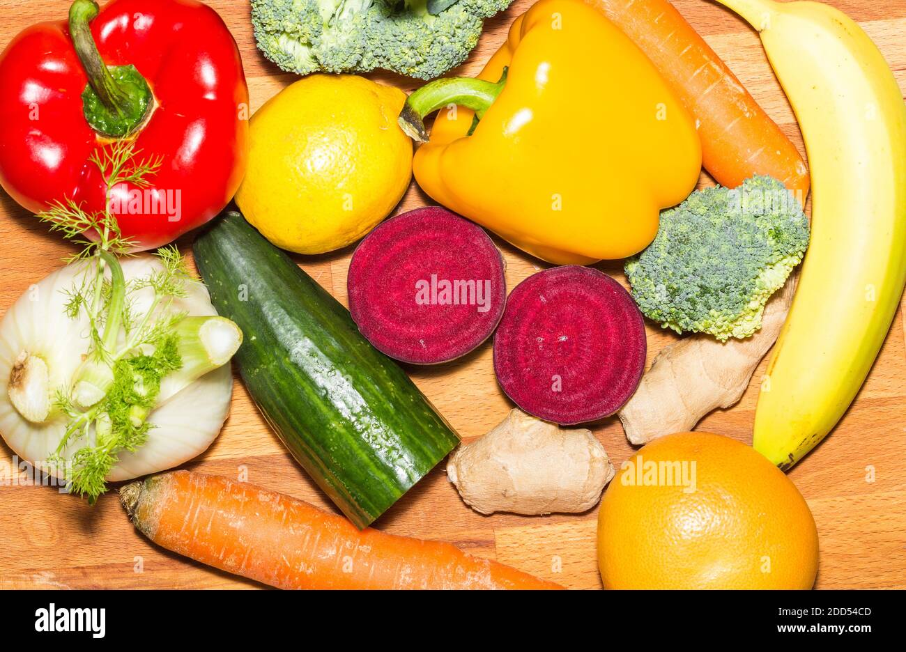 Fruit and vegetables on wooden background Stock Photo