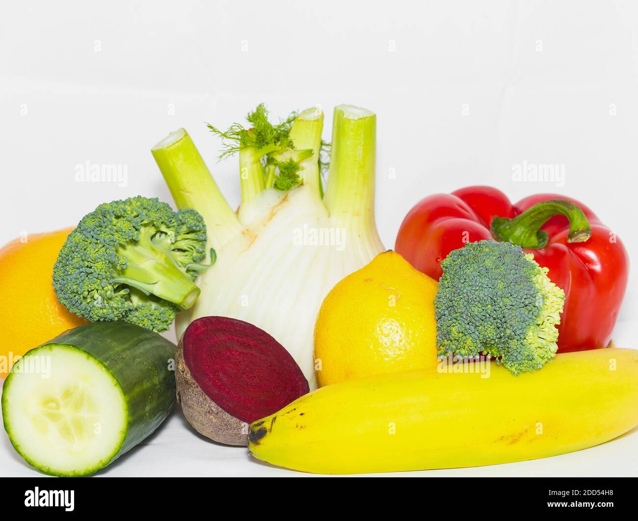 A pile of various fruits and vegetables on white background. Macro photography Stock Photo