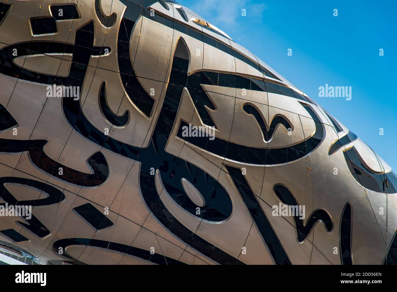 Dubai, United Arab Emirates - November 13, 2020: Closeup pattern of Arabic letters on The Museum of The Future in Dubai downtown built for EXPO 2020 s Stock Photo