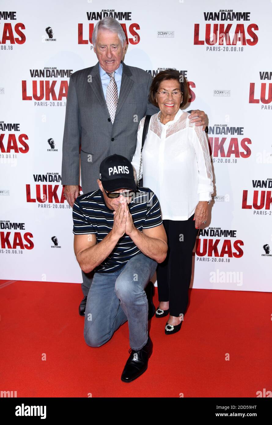 Jean-Claude Van Damme poses with his mother Eliana Van Varenbergh and  father Eugene Van Varenbergh attending Lukas (The Bouncer) Premiere at  Opera Gaumont in Paris, France on August 20, 2018. Photo by