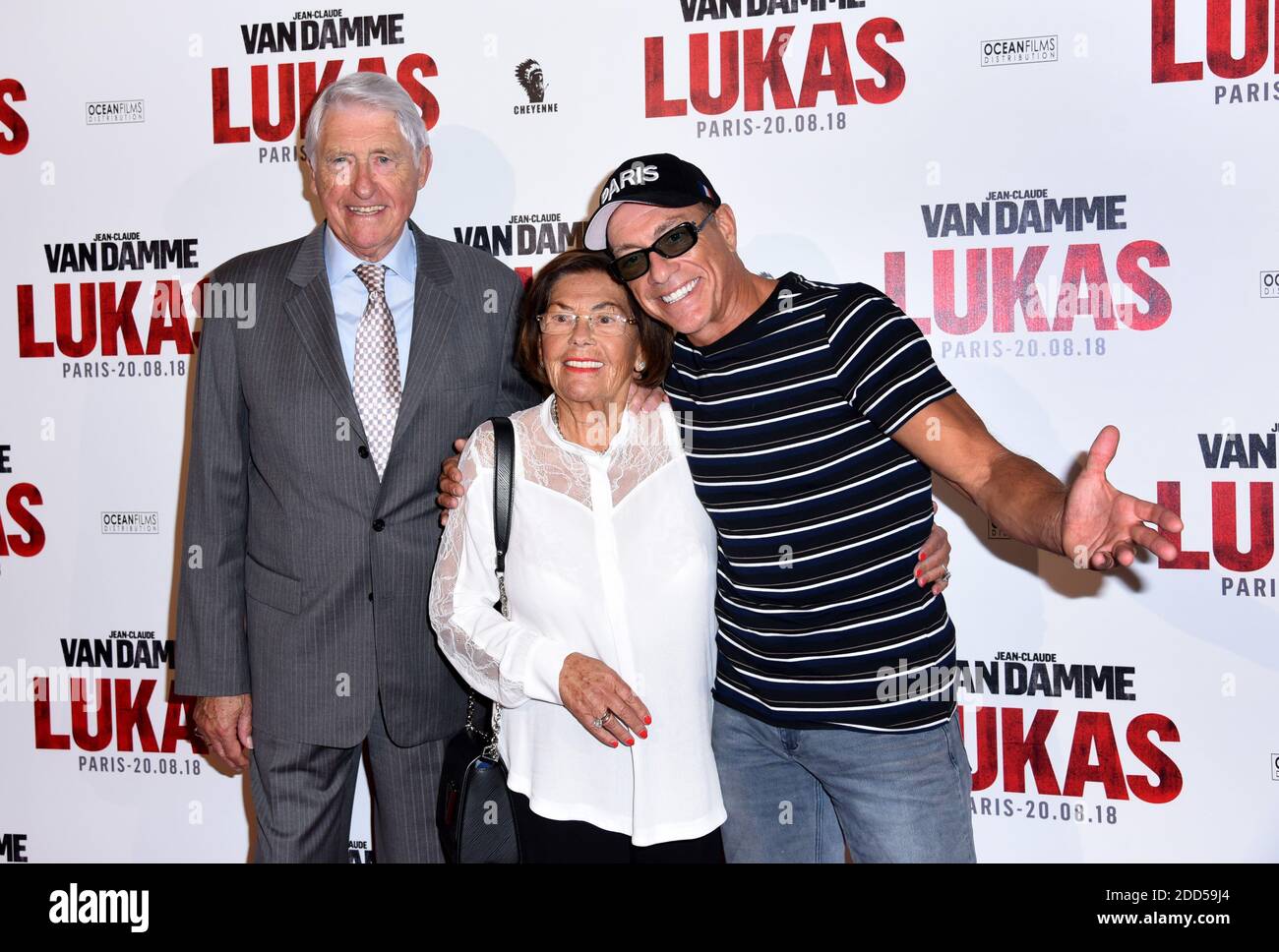 Jean-Claude Van Damme poses with his mother Eliana Van Varenbergh and  father Eugene Van Varenbergh attending Lukas (The Bouncer) Premiere at  Opera Gaumont in Paris, France on August 20, 2018. Photo by