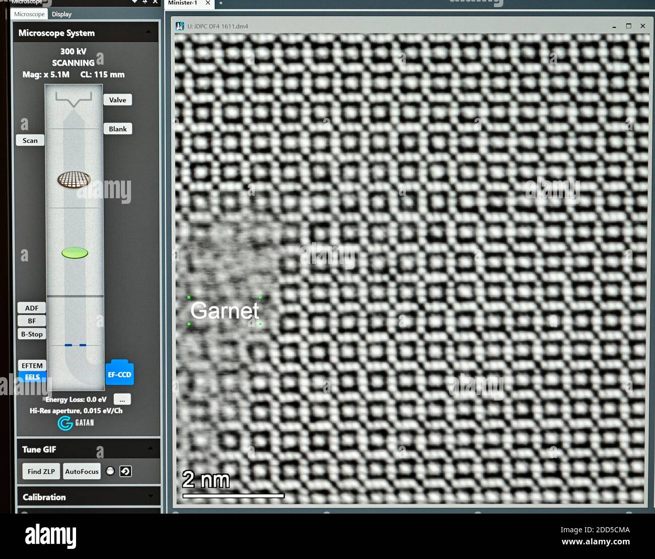 24 November 2020, Brandenburg, Potsdam: On a monitor at the Geoforschungszentrum (GFZ) the atomic structures of a mineral can be seen, which was recorded with the new transmission electron microscope (TEM). The TEM was put into operation the same day. With such a microscope smallest structures in the atomic range can be visualized and examined. It is based on an electron beam passing through a sample. The samples must be extremely thin for this purpose. The total investment for the TEM was around 3.3 million euros. The microscope will be used to examine wafer-thin layers of rock, metals and bi Stock Photo