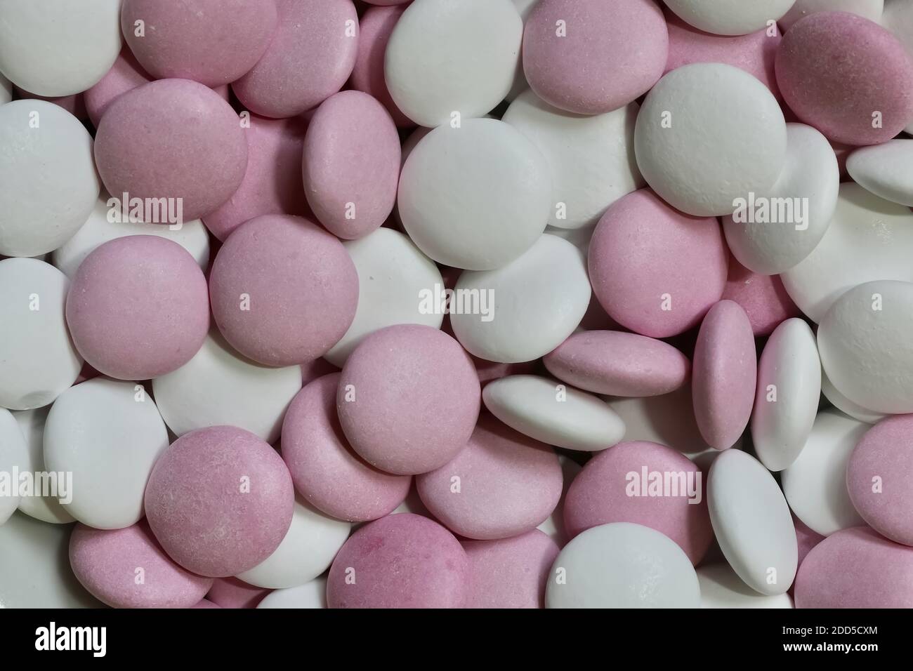 white and pink chocolate mints as background Stock Photo Alamy