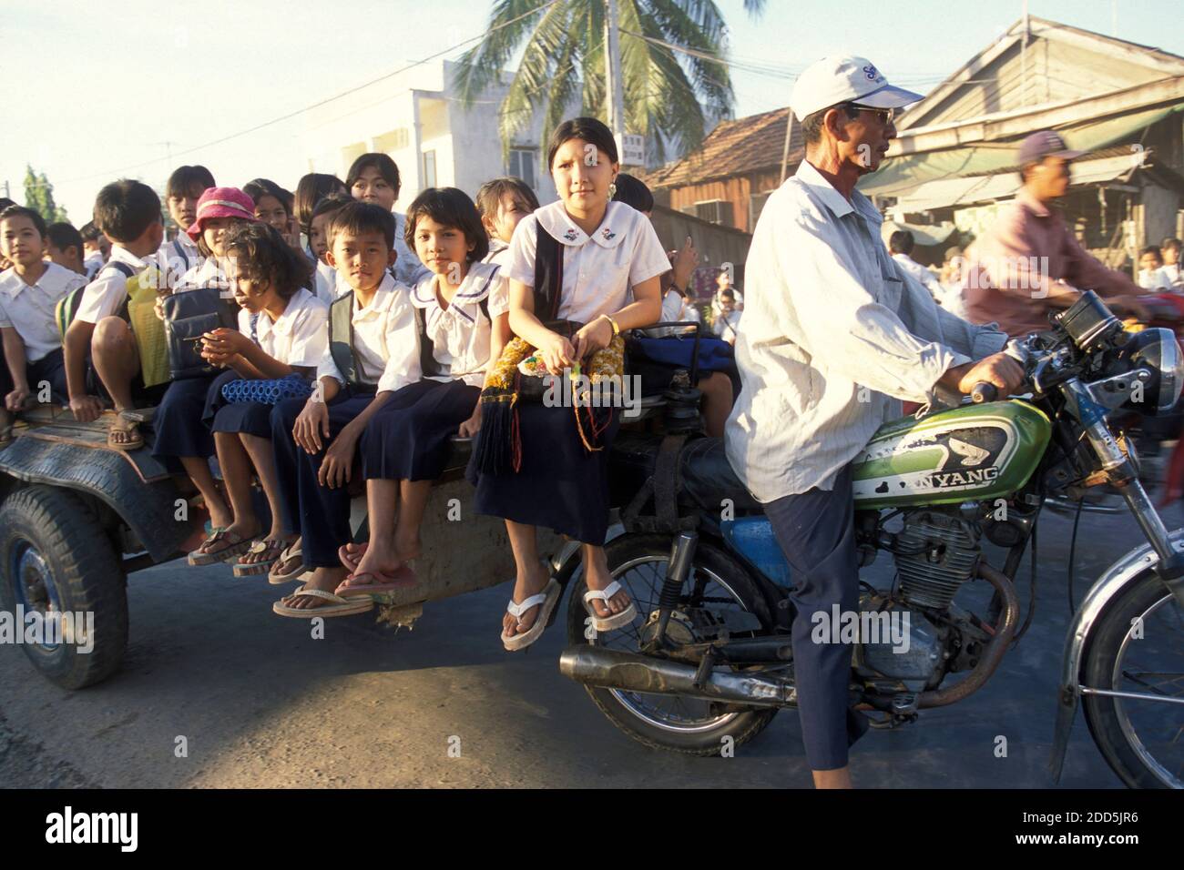 School childern on the way to school in the city of Phnom Penh of ...