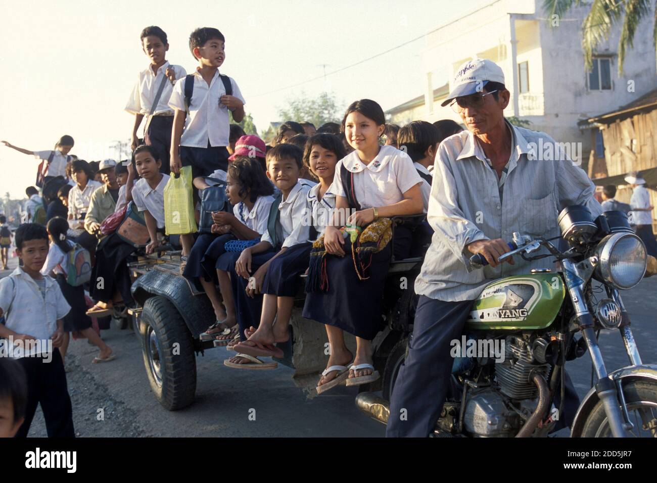 School childern on the way to school in the city of Phnom Penh of ...
