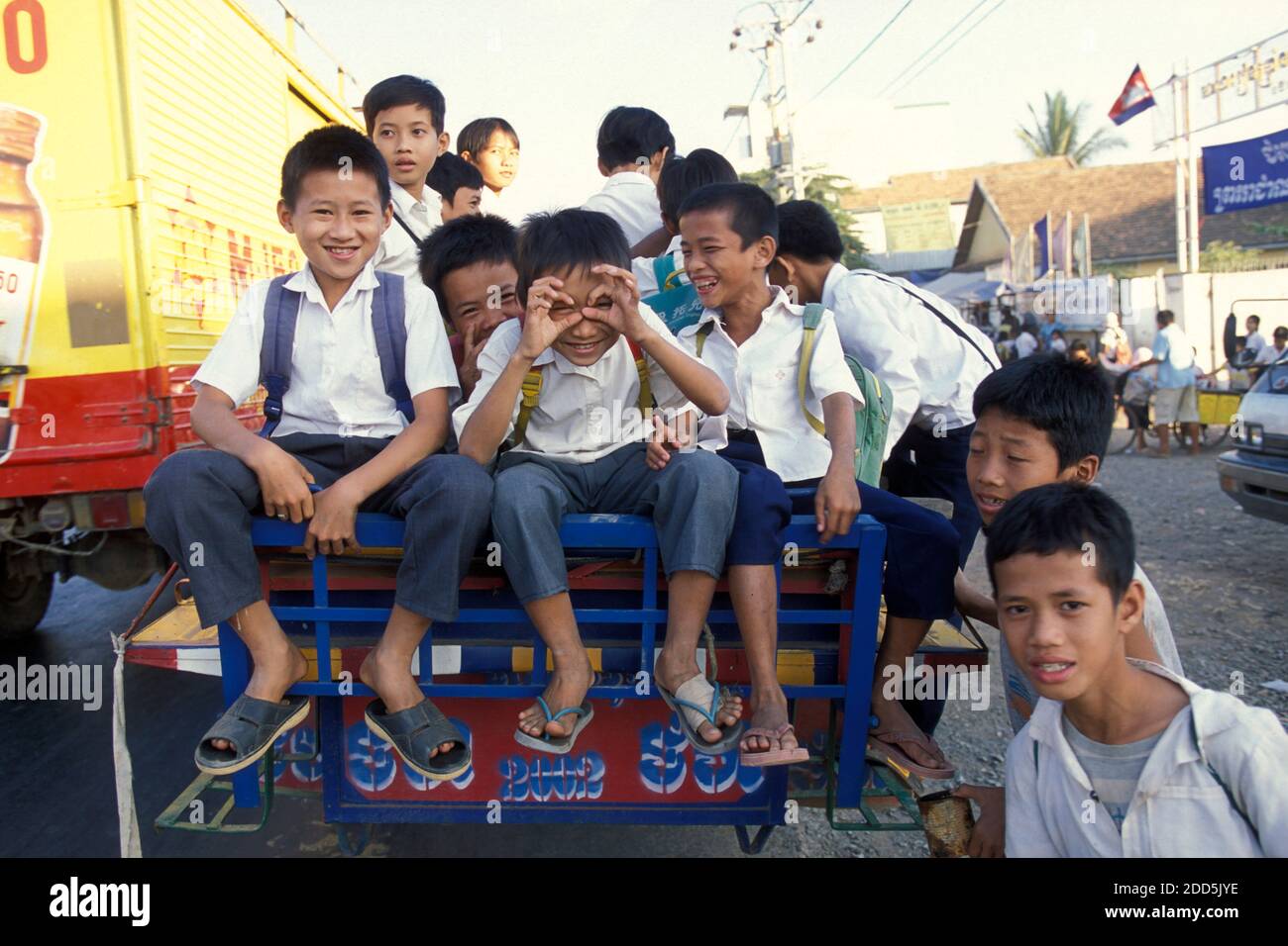 School childern on the way to school in the city of Phnom Penh of ...