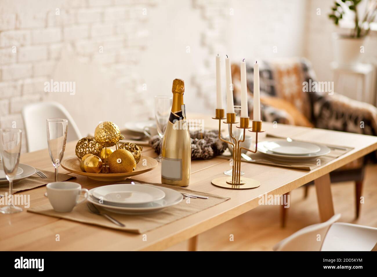 Christmas table setting with holiday decorations. Stock Photo