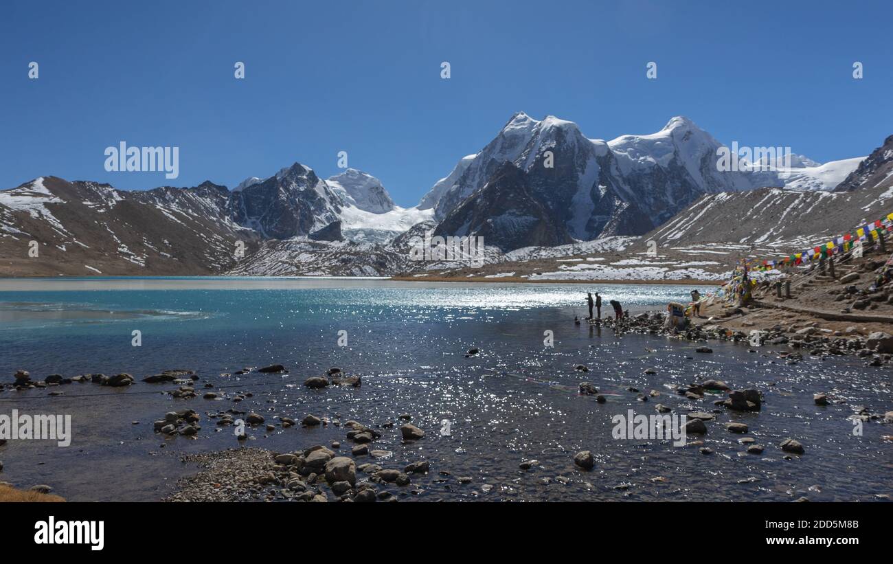 Gurudongmar Lake with zemu glacier in the background at Sikkim India Stock Photo