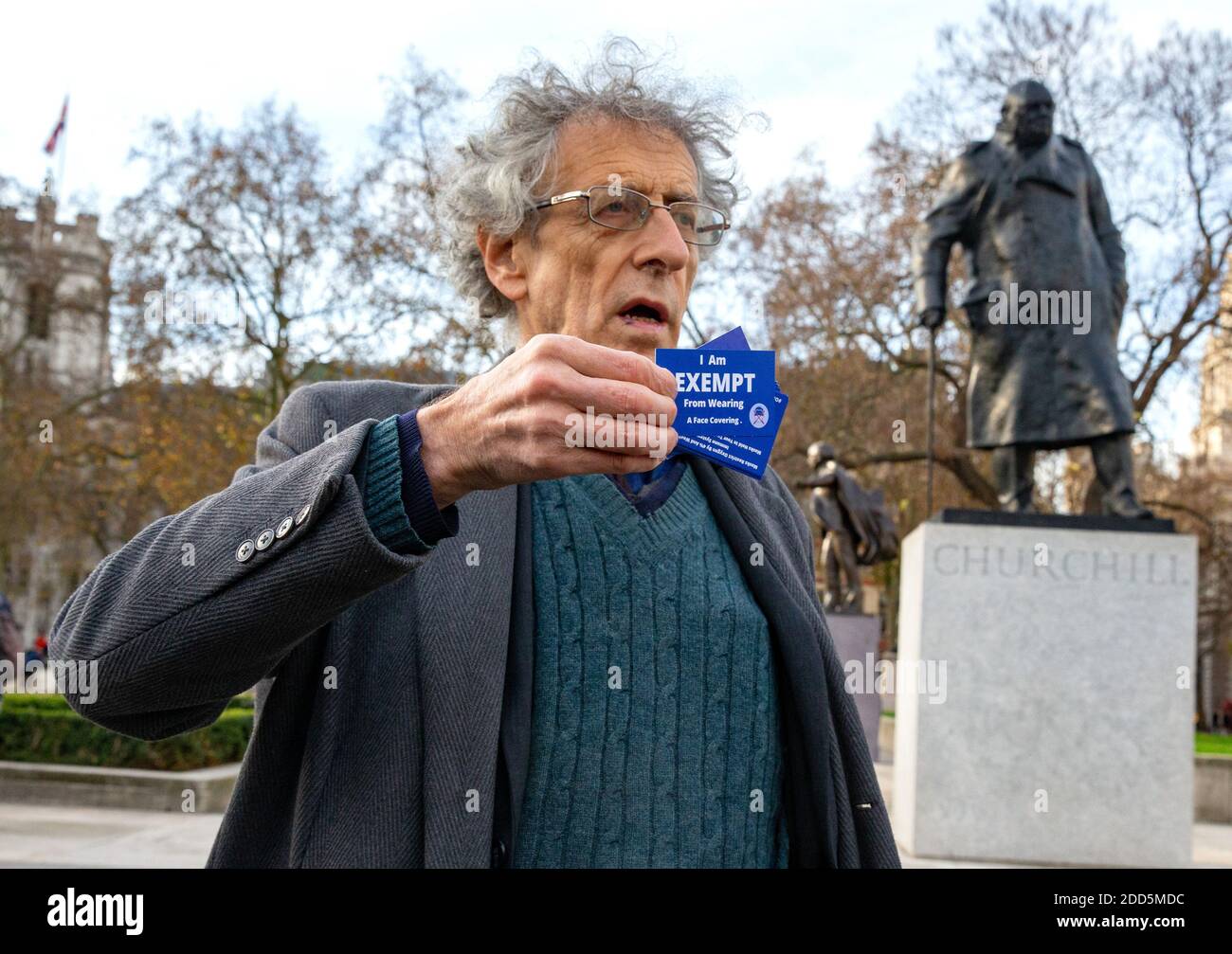 London, UK. 24th Nov, 2020. Piers Corbyn shows a facemask exemption card. Anti Vaccine protest. Piers Corbyn and other anti-vaccine protesters in Westminster. Credit: Mark Thomas/Alamy Live News Stock Photo