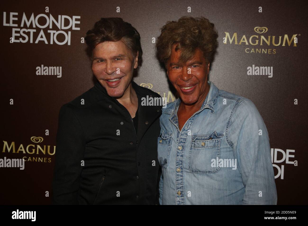 Igor and Grichka Bogdanoff attending Le Monde est a toi Party held at Plage  Magnum during The 71st Annual Cannes Film Festival on May 12, 2018 in Cannes,  France. Photo by Jerome