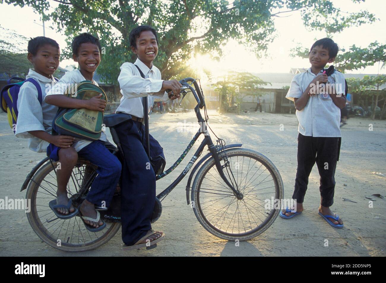 School childern on the way to school in the city of Phnom Penh of ...
