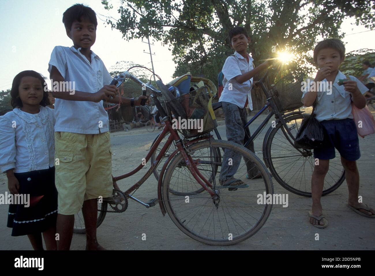 School childern on the way to school in the city of Phnom Penh of ...