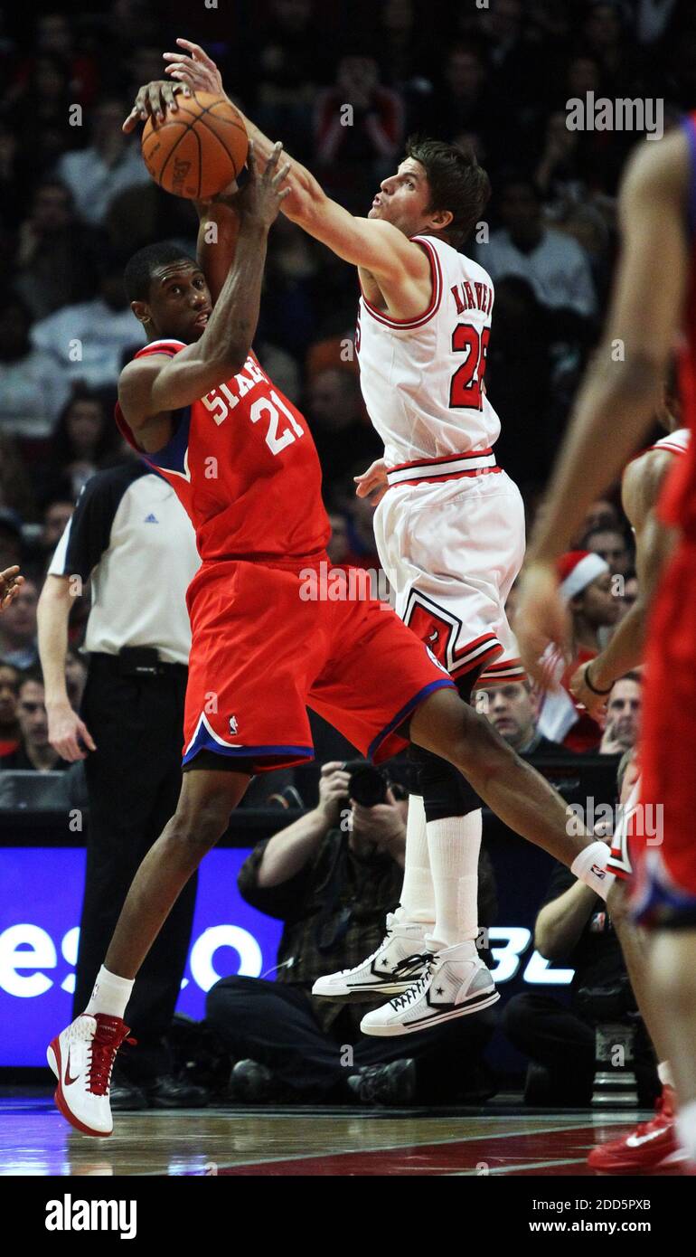 NO FILM, NO VIDEO, NO TV, NO DOCUMENTARY - Chicago Bulls' Kyle Korver (26) defends Philadelphia 76ers' Thaddeus Young (21) in the first half during the NBA Basketball match, Chicago Bulls vs Philadelphia 76ers at the United Center in Chicago, IL, USA on December 21, 2010. The Bulls rolled to a 121-76 victory. Photo by Chris Sweda/Chicago Tribune/MCT/ABACAPRESS.COM Stock Photo