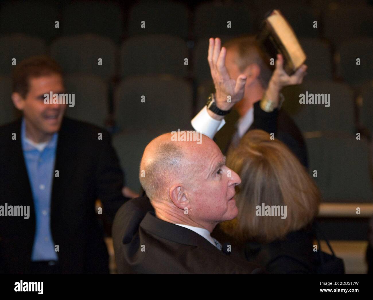 NO FILM, NO VIDEO, NO TV, NO DOCUMENTARY - Gov. Jerry Brown, with his wife, Anne Gust Brown, right, waves to a cheering crowd after he was sworn in as California's 39th governor during his inauguration at Memorial Auditorium, Monday, January 3, 2011, in Sacramento, California. Photo by Randy Pench/Sacramento Bee/MCT/ABACAPRESS.COM Stock Photo