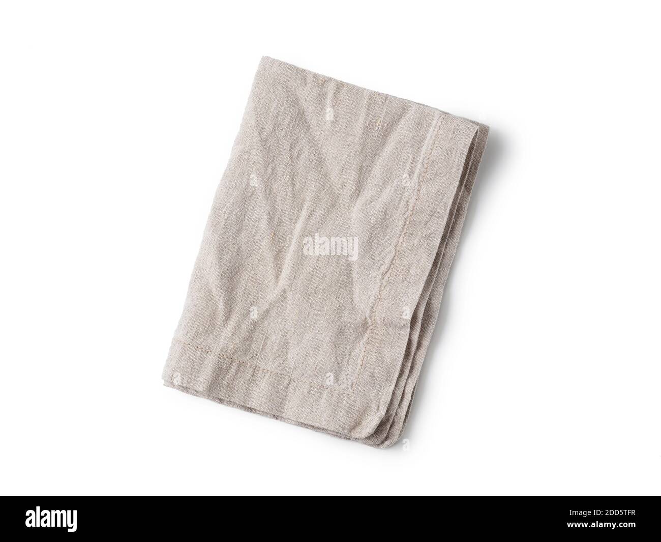 Folded gray linen napkin isolated on white background. Natural light