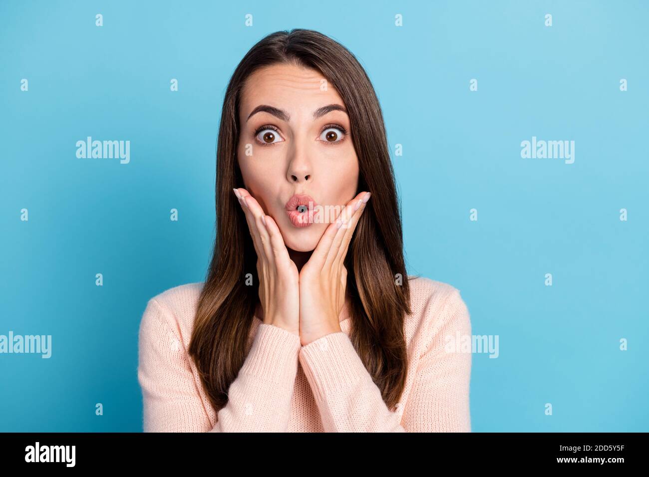 Portrait of astonished girl scream touch hands face with open mouth ...