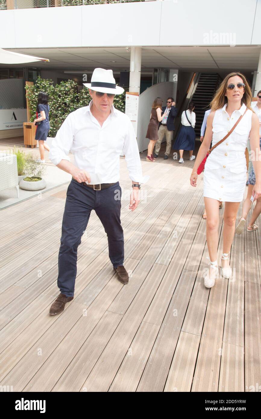Hugh Grant And Anna Elisabeth Eberstein In Village During French Tennis Open At Roland Garros Arena On June 10 18 In Paris France Photo By Nasser Berzane Abacapress Com Stock Photo Alamy