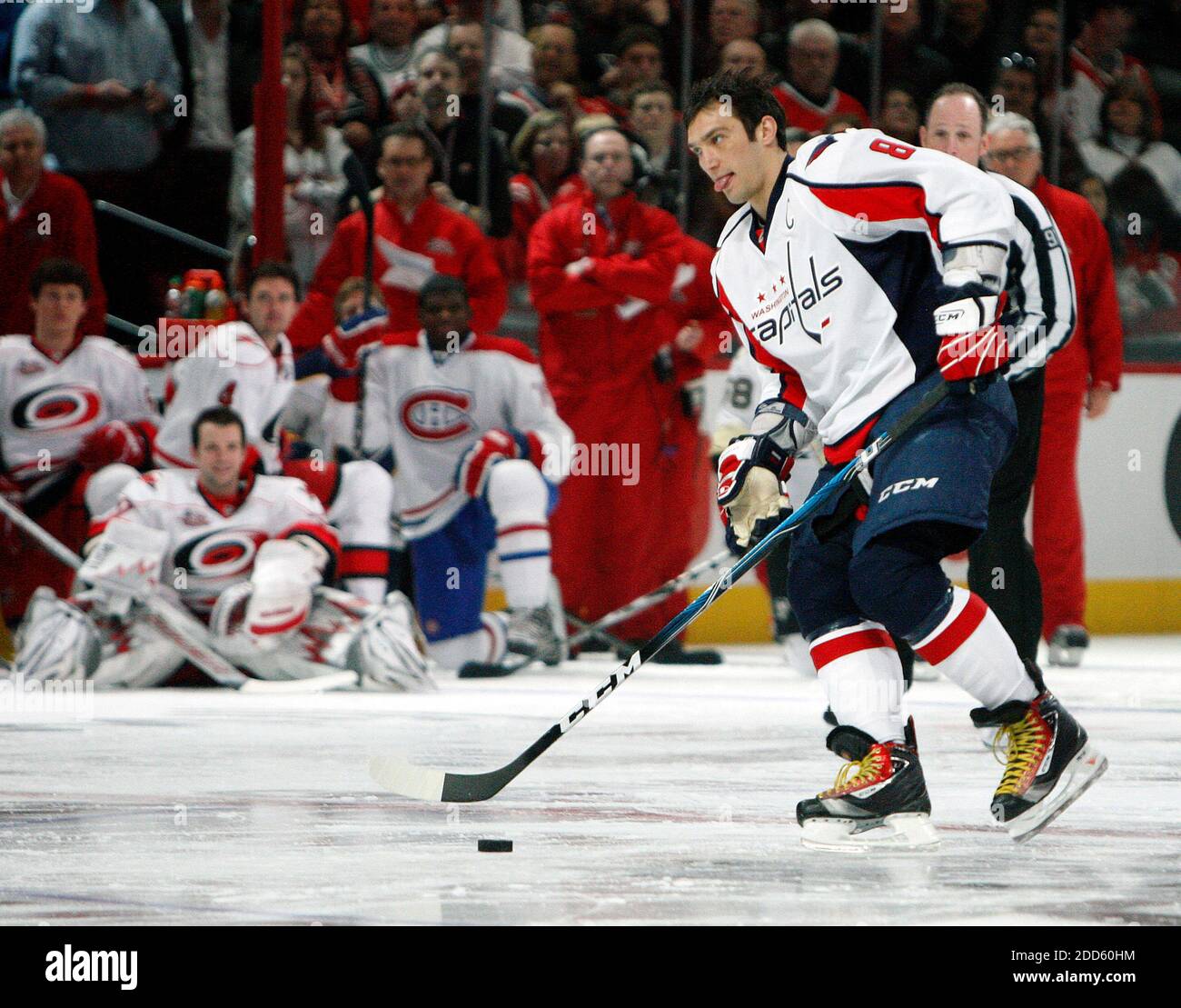 NO FILM, NO VIDEO, NO TV, NO DOCUMENTARY - Alex Ovechkin, of the Washington Capitals, sticks out his tongue as he gets ready to shoot in the Breakaway Challenge competition during the Skills Competition of the NHL All-Star Game at the RBC Center in Raleigh, North Carolina, USA on January 29, 2011. Photo by Chris Seward/Raleigh News & Observer/MCT/ABACAPRESS.COM Stock Photo