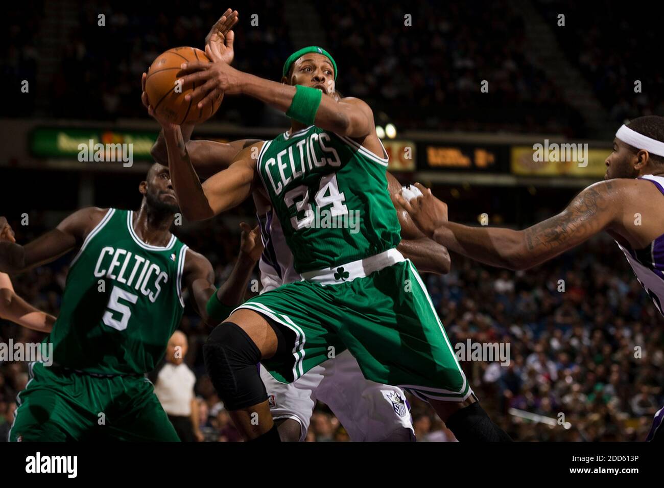 NO FILM, NO VIDEO, NO TV, NO DOCUMENTARY - The Boston Celtics' Paul Pierce  (34) passes off while driving to the basket in the fourth quarter during  the NBA Basketball match, Boston