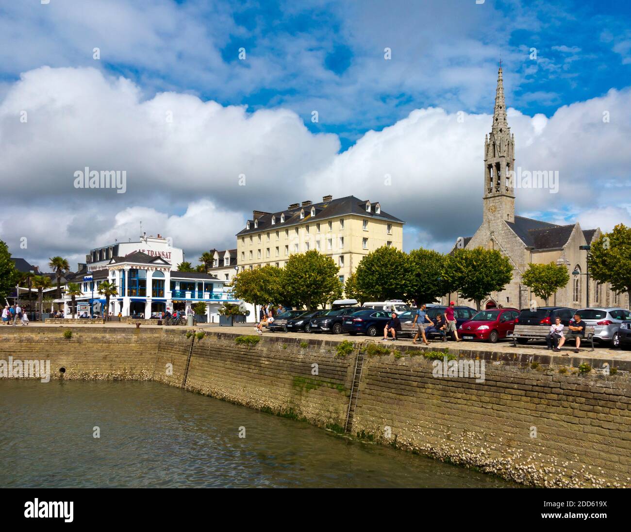 The harbour wall at Benodet a coastal town on the River Odet estuary in Finistere Brittany north west France. Stock Photo