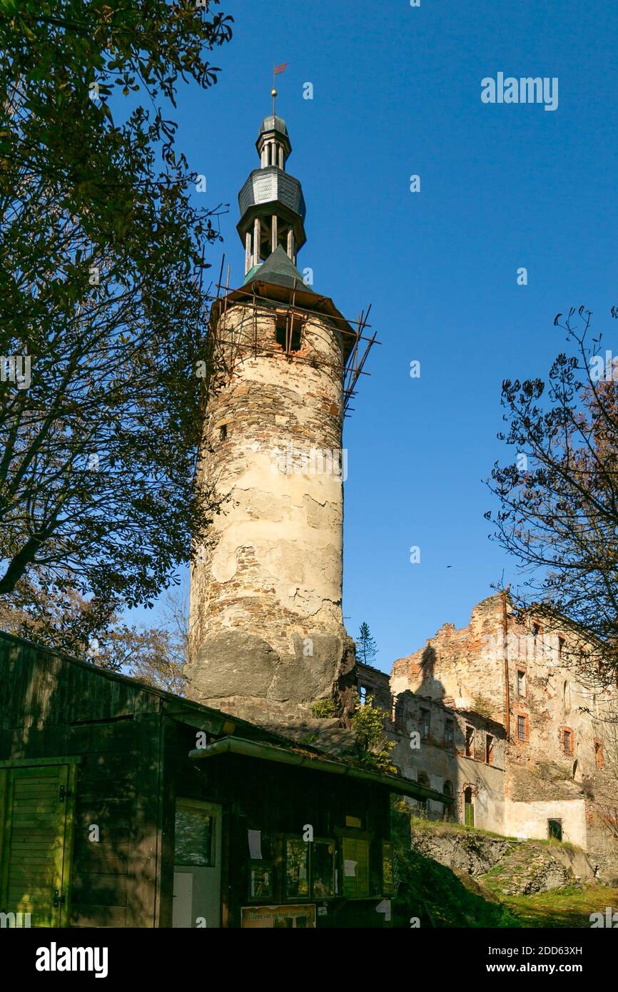 Hartenberg, Czech Republic - October 14 2018: View of a tower surrounded with scaffolding, a new grey roof, part of the gothic castle in reconstructio Stock Photo