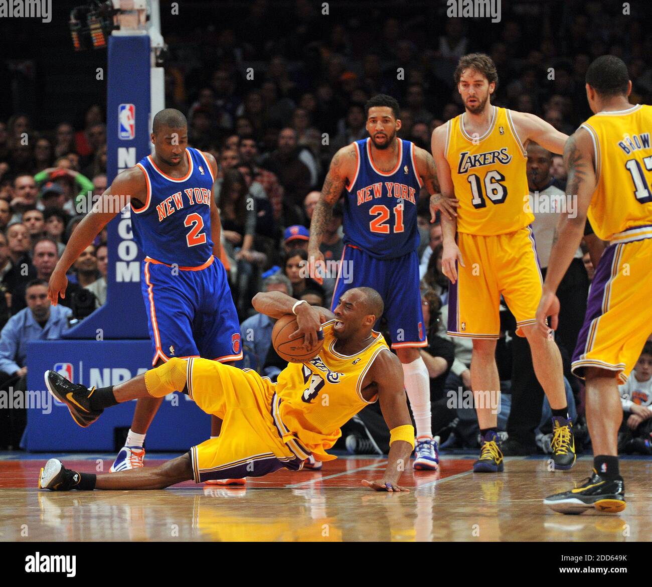 NO FILM, NO VIDEO, NO TV, NO DOCUMENTARY - Los Angeles Lakers point guard Kobe Bryant (24) falls to the court after being fouled by New York Knicks point guard Raymond Felton (2) during NBA Basketball match, New York Knicks vs Los Angeles Lakers at Madison Square Garden in New York City, USA on February 11, 2011. Los Angeles Lakers won 113-96. Photo by Christopher Pasatieri/Newsday/MCT/ABACAPRESS.COM Stock Photo