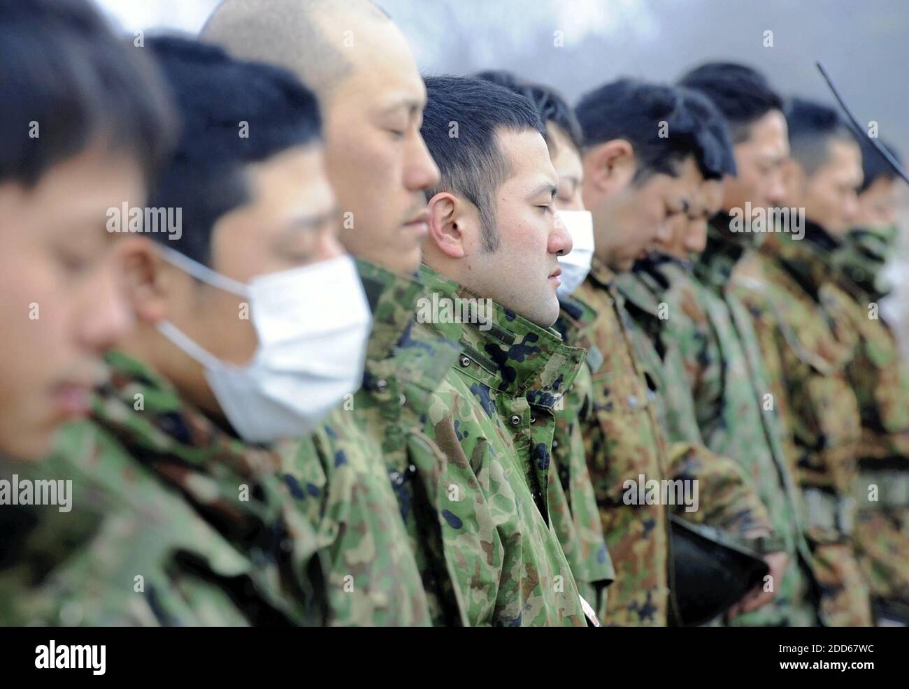 NO FILM, NO VIDEO, NO TV, NO DOCUMENTARY - GSDF members observe a moment of silence for disaster victims Saturday morning before starting the day's search-and-rescue operations, March 26, 2011. Photo by Yomiuri Shumbun/MCT/ABACAPRESS.COM Stock Photo